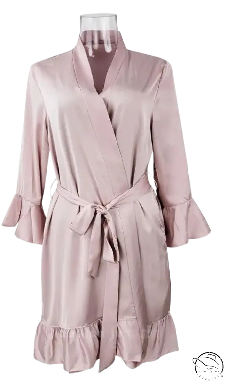 Pale pink silk lotus robe with ruffled belted sleeves and hem
