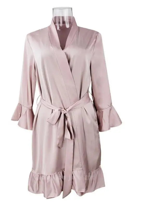 Pale pink satin robe with ruffled sleeves, inspired by silk lotus pajamas for elegant spring and fall wear