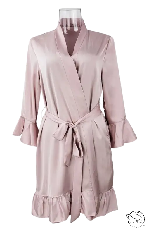 Pale pink silk lotus robe with ruffled belted sleeves and hem