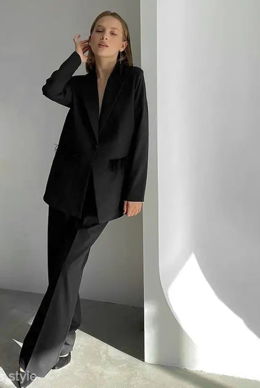Woman’s black pantsuit from Elegant Spring Casual Set with design feather stitching