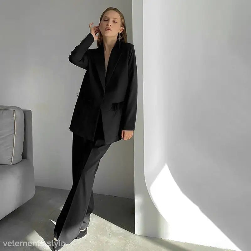 Woman’s black pantsuit from Elegant Spring Casual Set with design feather stitching
