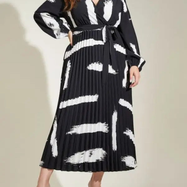 Black and white pleated maxi dress featuring abstract pattern, Elegant Tala Dress with Belted V-Neck