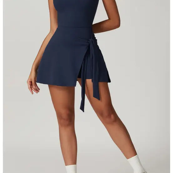 Navy blue sleeveless mini dress with a side tie detail.