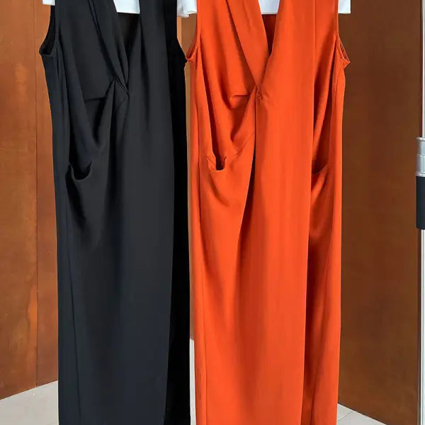 Two sleeveless, floor-length dresses with draped fronts in black and bright orange.