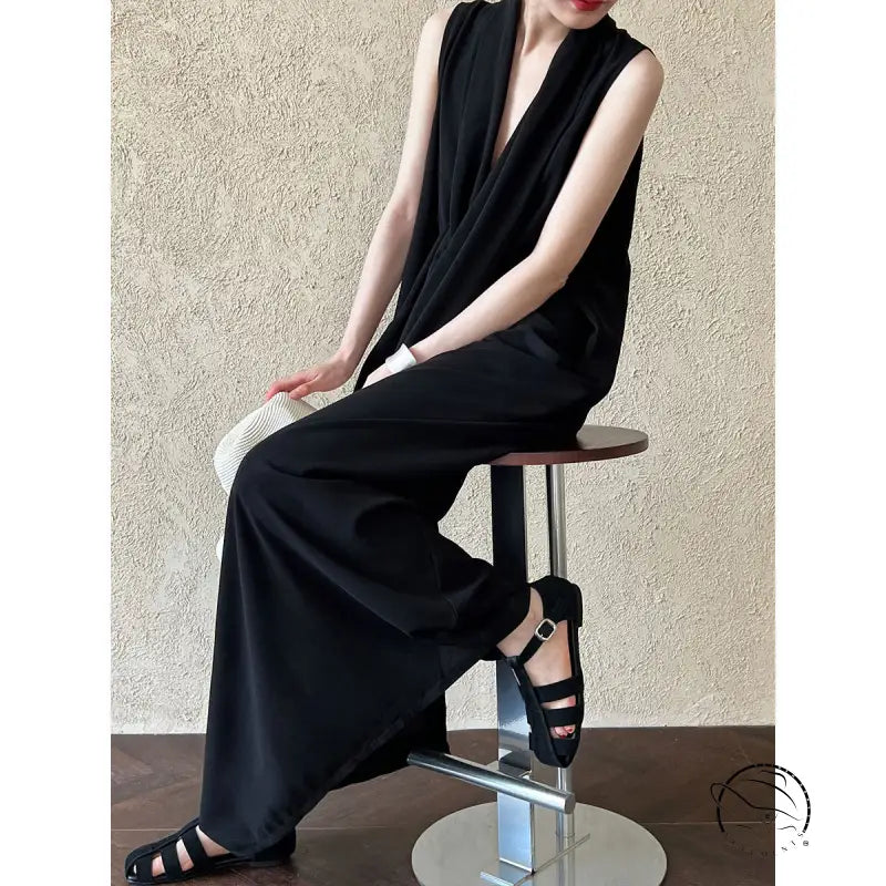 Elegant v neck long dress in sleek black with wide-leg pants and plunging neckline
