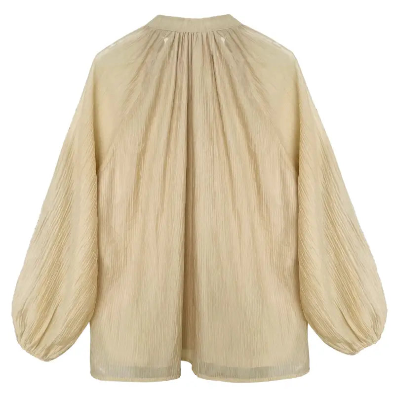 Beige blouse with balloon sleeves for a comfy shirt wide style and versatile wear