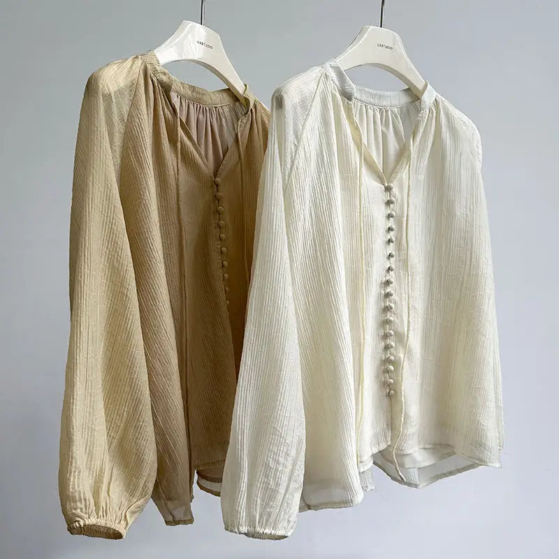 Elegant V-Neck Polyester Shirt displayed with wide leg shorts for a comfy shirt wide look