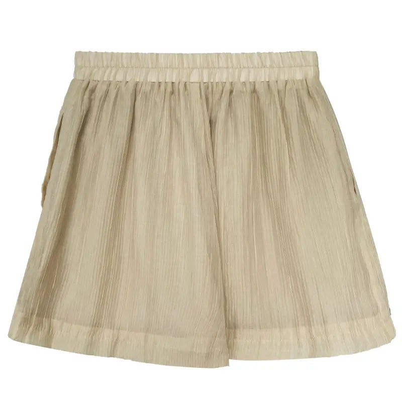 Beige pleated elastic-waist shorts paired with a comfy shirt in oolong tea yellow