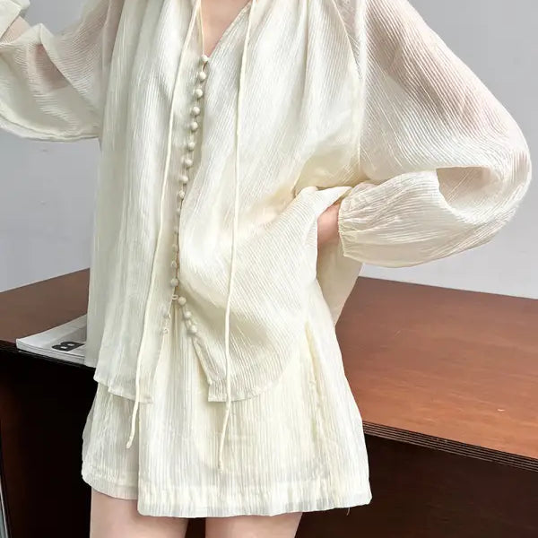 Cream-colored textured blouse and wide leg shorts set in oolong tea yellow, comfy style