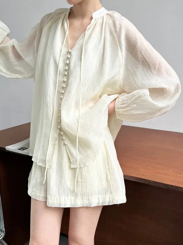 Cream-colored textured blouse and wide leg shorts set in oolong tea yellow, comfy style