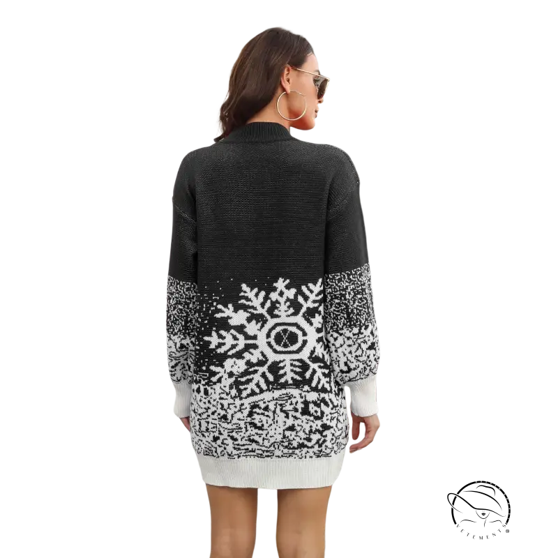 Elegant woolen snowflake jacquard lantern sleeve sweater dress in black and white with large snowflake pattern on back