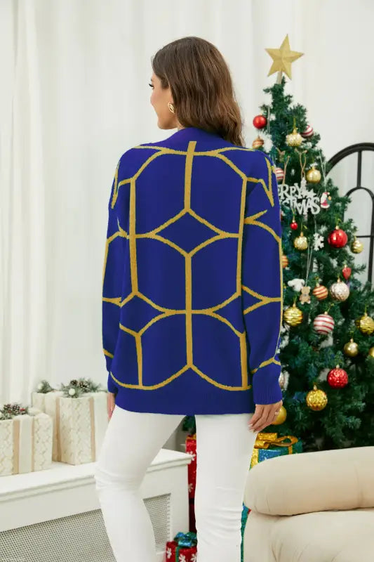 Emerald green contrast color pattern knitted Christmas sweater with blue and yellow design