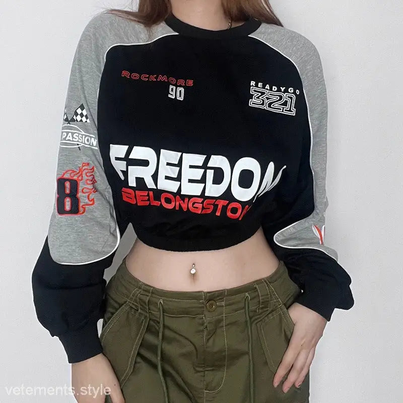 Fashionable Flair Sweater with FREEDOM BELONGS TO text and graphic design on black gray fabric