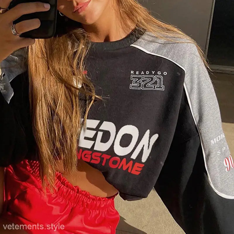 Fashionable Flair Sweater with Racing-inspired design in black, gray, and red blocks for sexy autumn winter style