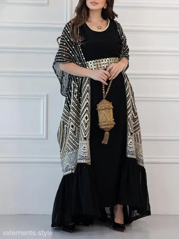 Fashionable urban casual black abaya dress with ornate shawl and gold belt