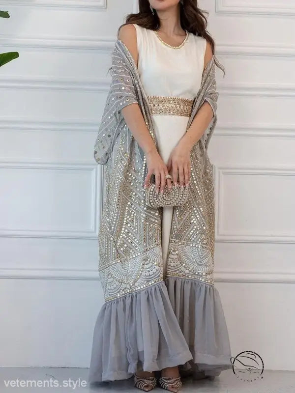 Fashionable urban casual maxi dress with white bodice and gray beaded shawl