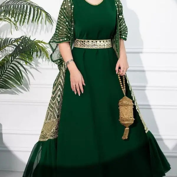 Emerald green fashionable urban casual maxi dress with gold embellishments and sheer overlay