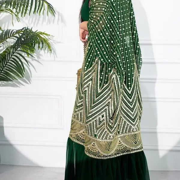 Elegant green and gold embroidered kaftan with intricate geometric patterns for fashionable urban casual style