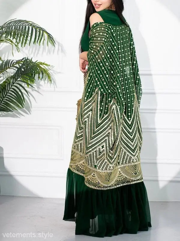 Elegant green and gold embroidered kaftan with intricate geometric patterns for fashionable urban casual style