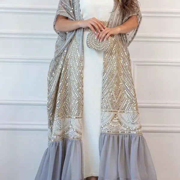 Elegant long white dress with ornate gray and gold embroidered open robe overlay for fashionable urban casual style