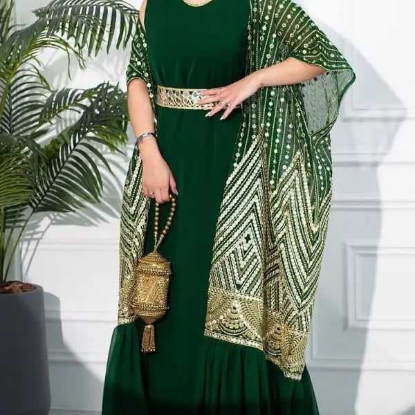 Emerald green fashionable urban casual maxi dress with ornate gold shawl and matching belt