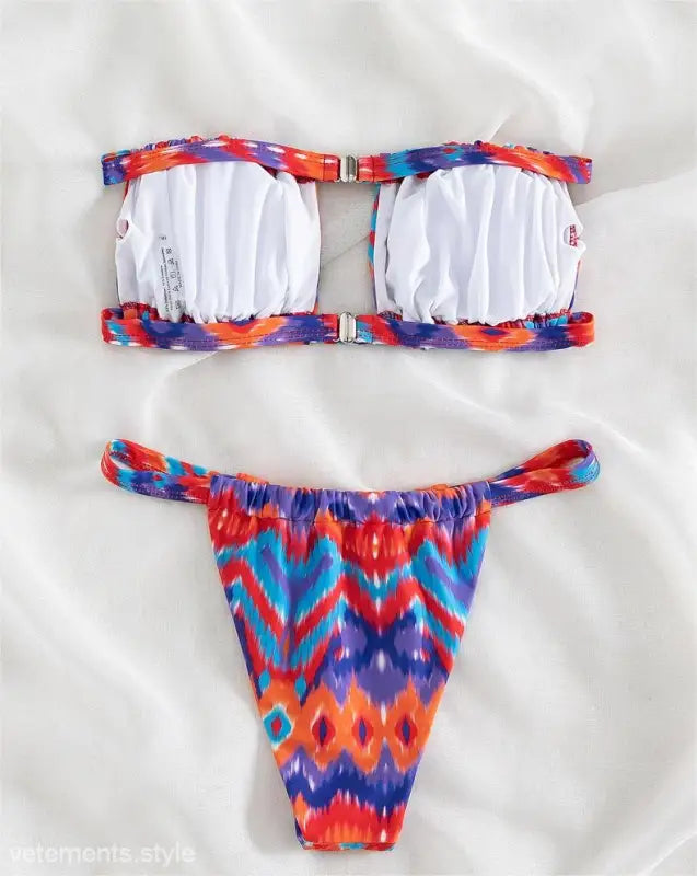 Floral primary color printed bikini with cutout design and vibrant geometric pattern, free shipping