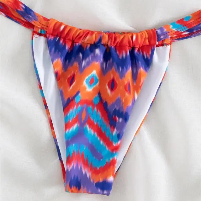 Colorful ikat-style bikini bottom with floral primary color print and free shipping