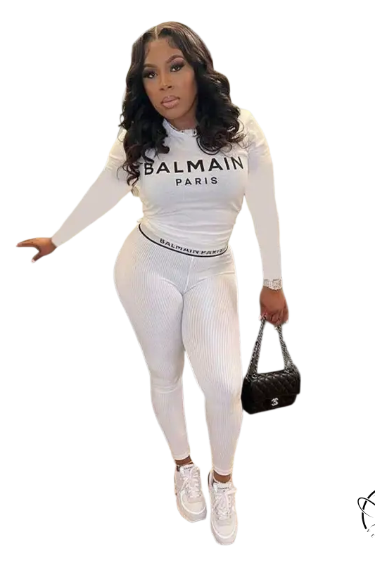 Woman in white Balmain floral unique two piece set