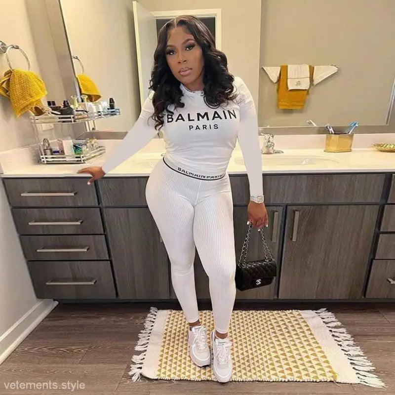 Woman in white Balmain outfit showcasing Floral Unique Two Piece Set with Slim Long Sleeves