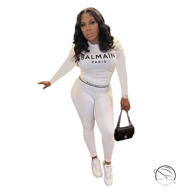 Woman in white Balmain floral unique two piece set