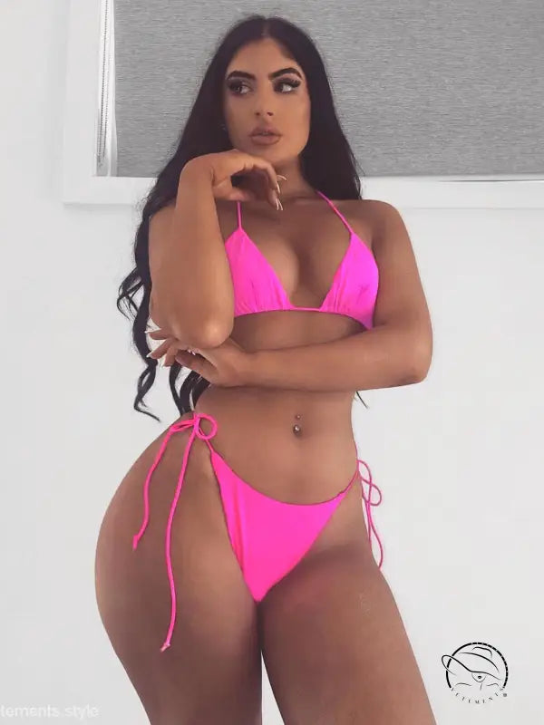 Woman in fluorescent yellow sexy bandage bikini with cameo brown hair