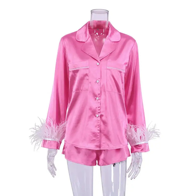 Pink satin pajama set with feather trim from French Christmas silk lounge collection