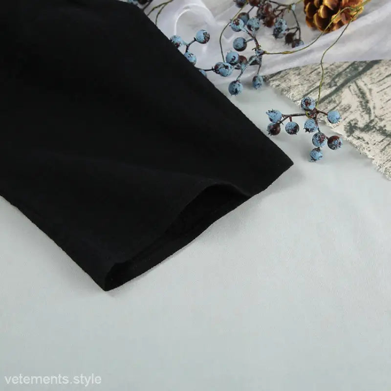 Black fabric sleeve of French Cotton Pajamas Two Piece Lounge Set with Tie Sleeves