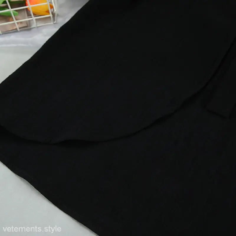 Black fabric drape of French Cotton Pajamas Two Piece Lounge Set with Tie Sleeves