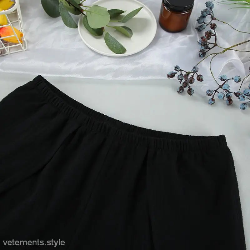Black elastic-waist pants part of French Cotton Pajamas Two Piece Lounge Set with Tie Sleeves