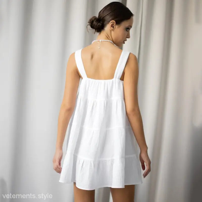 White sleeveless summer dress, a stylish sexy French nightdress or French nightdress pajamas