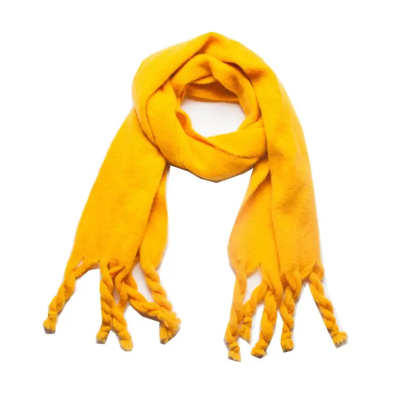Yellow fringed scarf featured in a stylish wool scarf winter collection
