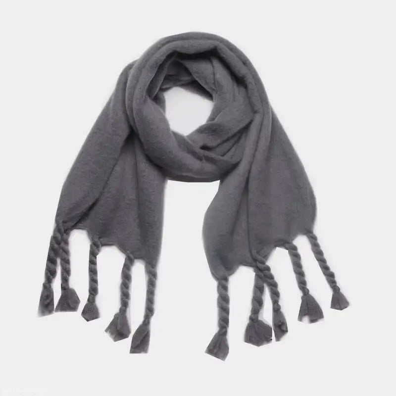 Gray wool scarf with braided tassels, perfect for winter wear and stylish shawl layering