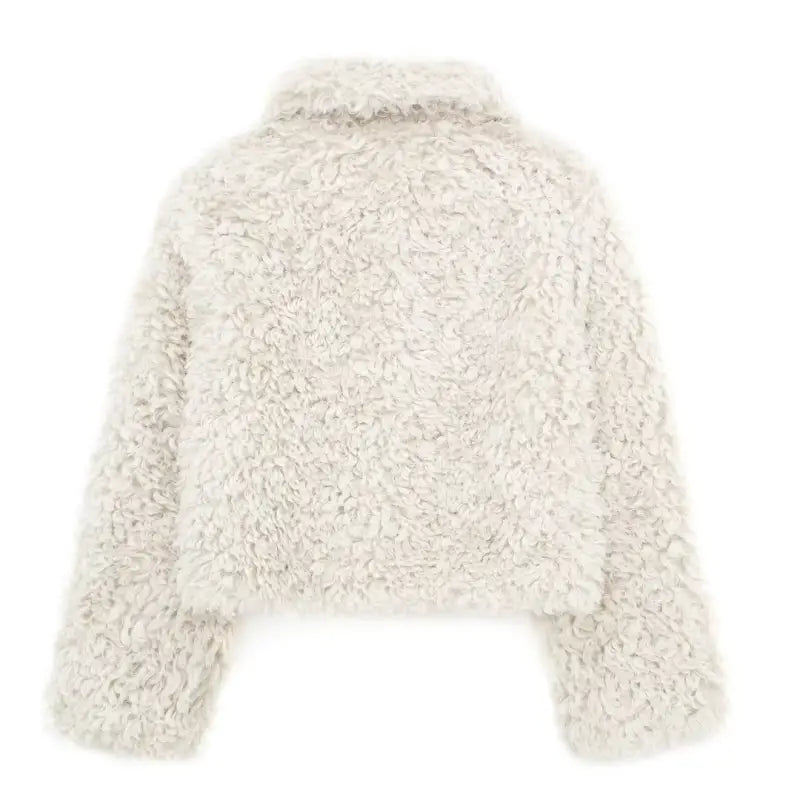 Cream-colored fluffy short jacket perfect for a nightout or winter furry short occasions