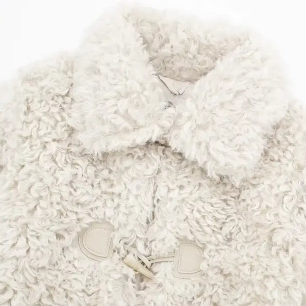 Cream-colored faux fur coat with toggle closures for cozy winter nightout furry jacket
