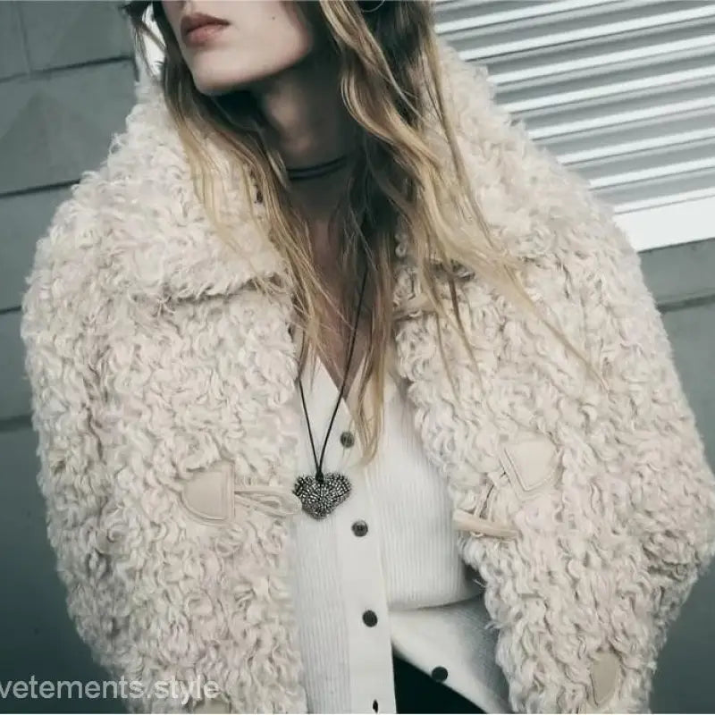 Cream-colored textured faux-fur coat for a stylish nightout furry jacket in winter