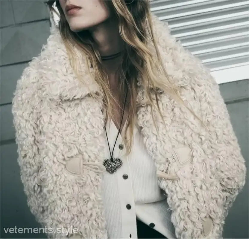 Cream-colored textured faux-fur coat for a stylish nightout furry jacket in winter