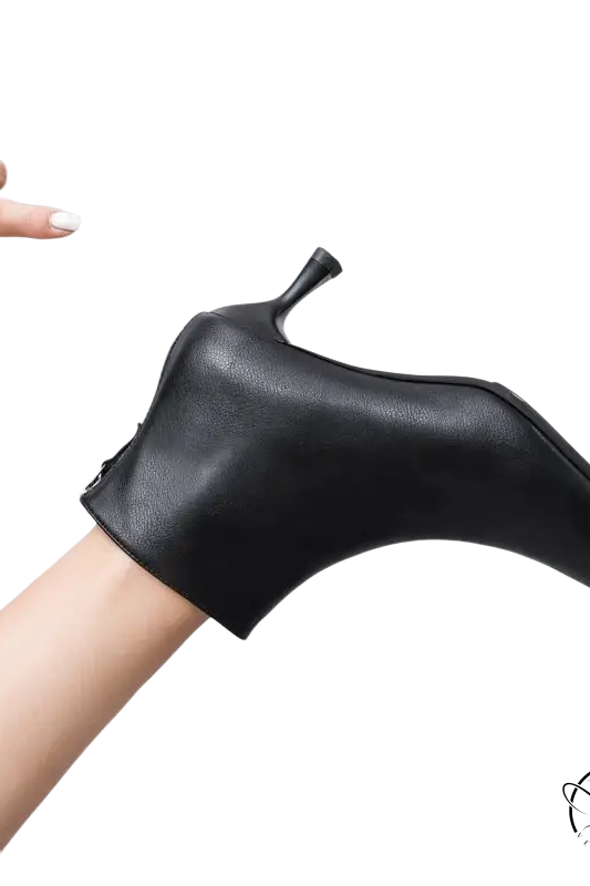 Black leather short boots with pointed toe and slim heel for winter fashion