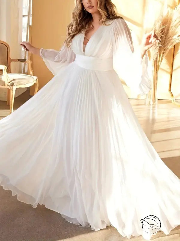 Gorgeous evening dress with flowing white pleated skirt and trumpet sleeves