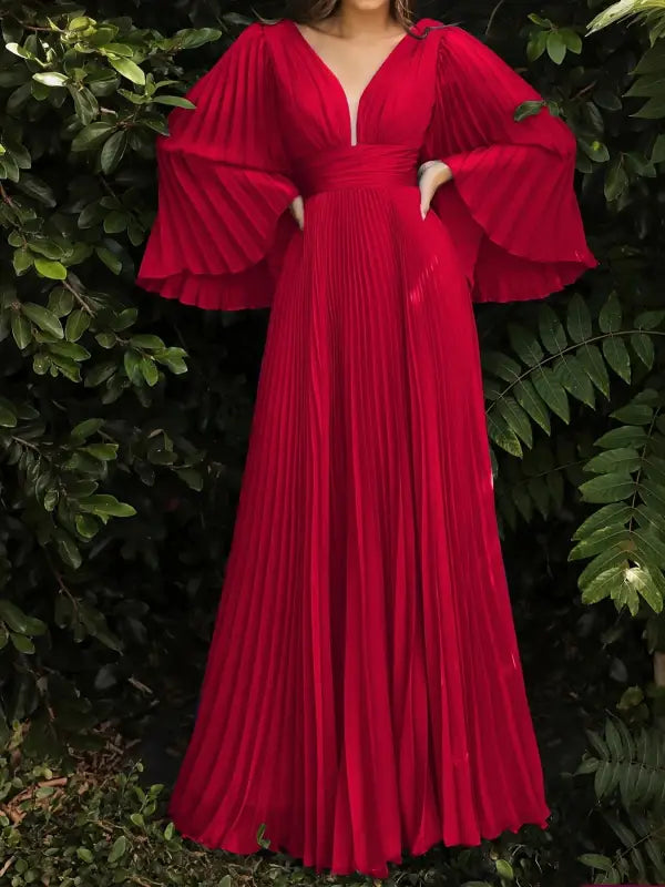 Red pleated gown with bell sleeves from gorgeous evening dress collection