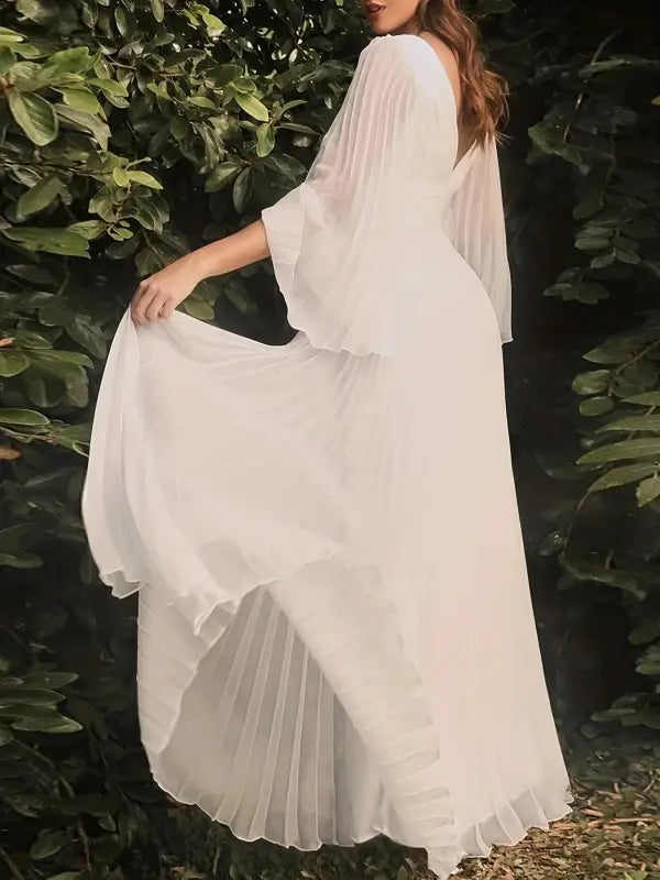 Flowing white pleated dress from Gorgeous Evening Dress with Trumpet Sleeves and Elegant Design