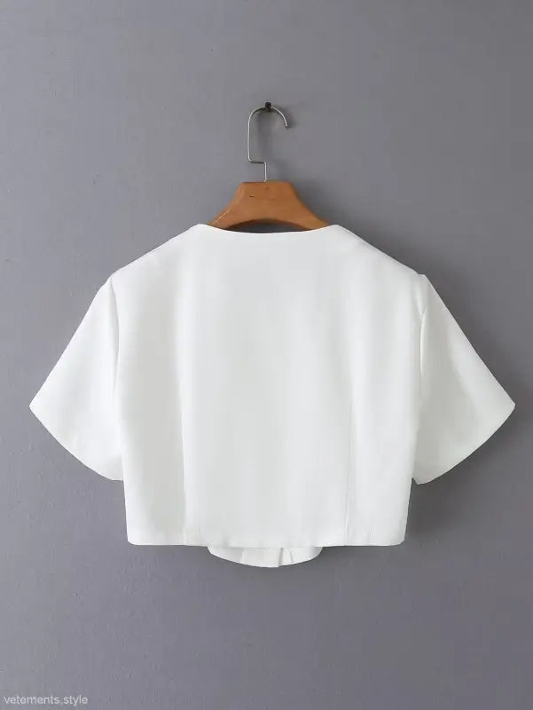 White cropped blouse from Gorgeous Yacht Fit with high waist and button detail