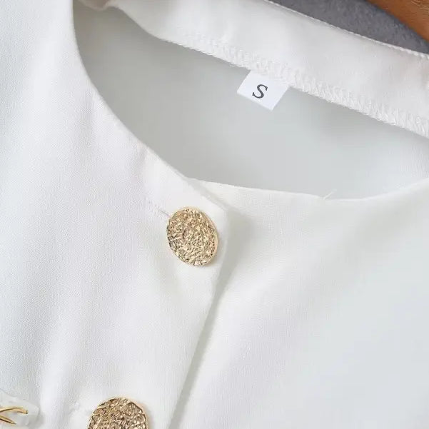 White blouse with gold buttons from the GORGEOUS YACHT FIT collection, perfect for high waist suits