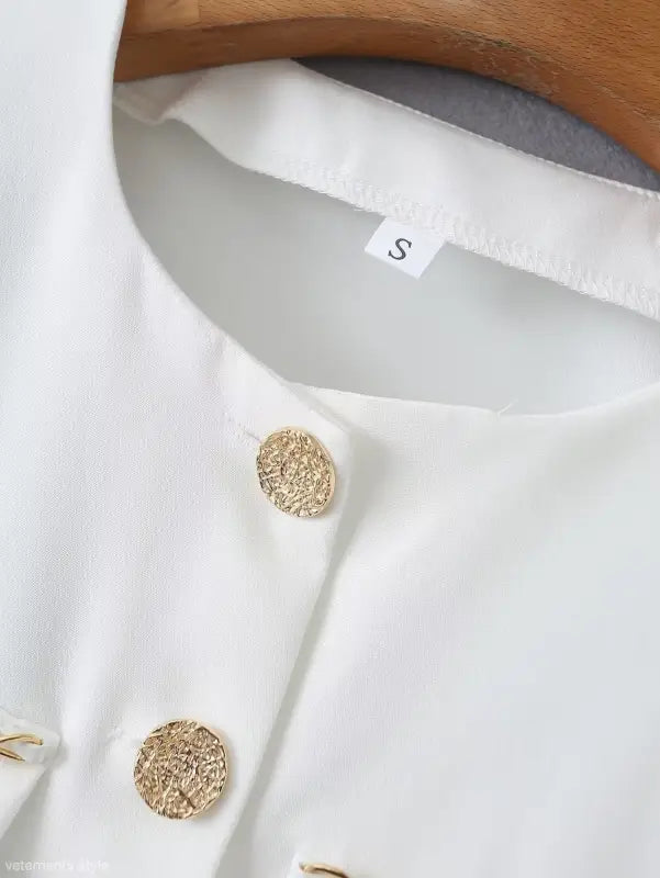 White blouse with gold buttons from the GORGEOUS YACHT FIT collection, perfect for high waist suits