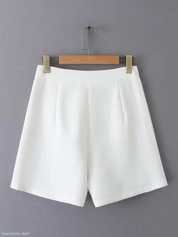 White pleated shorts from the Gorgeous Yacht Fit collection, high waist suit cardigan short